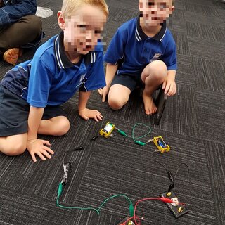 The Evolution of Coding Toys: Bridging Play, Pedagogy, and AI Competence