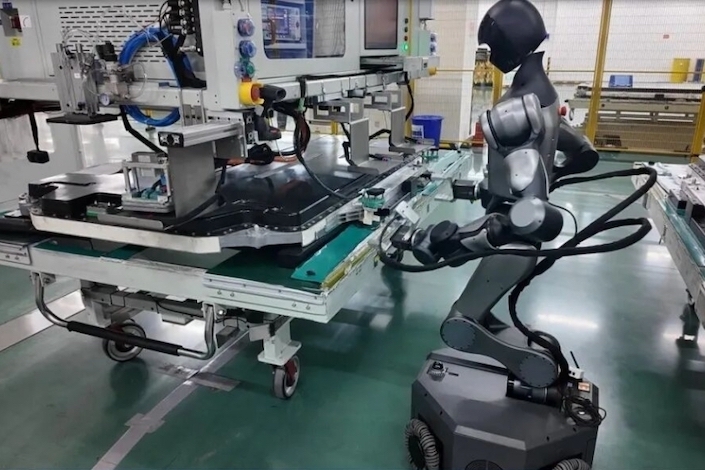 humanoid robot factory assembly - CATL Tests Humanoid Robots on Battery Production Lines - Caixin Global