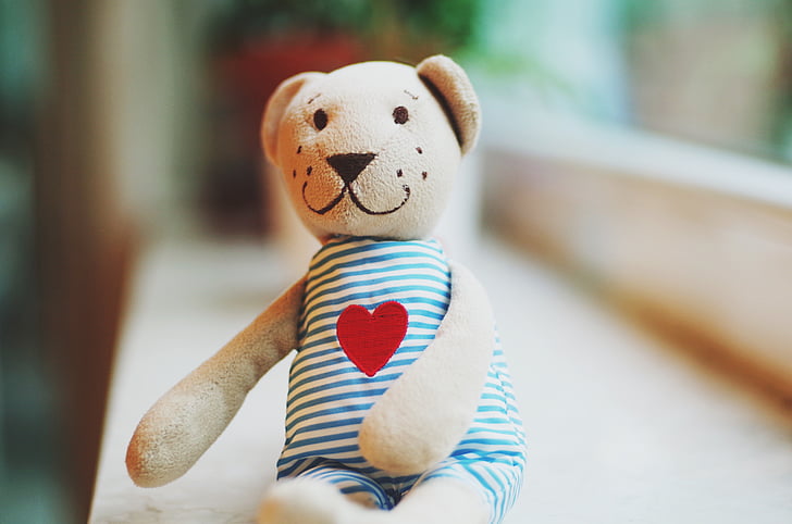 Keywords:
child hugging smart teddy bear - Royalty-Free photo: Beige bear wearing blue rompers plush toy ...