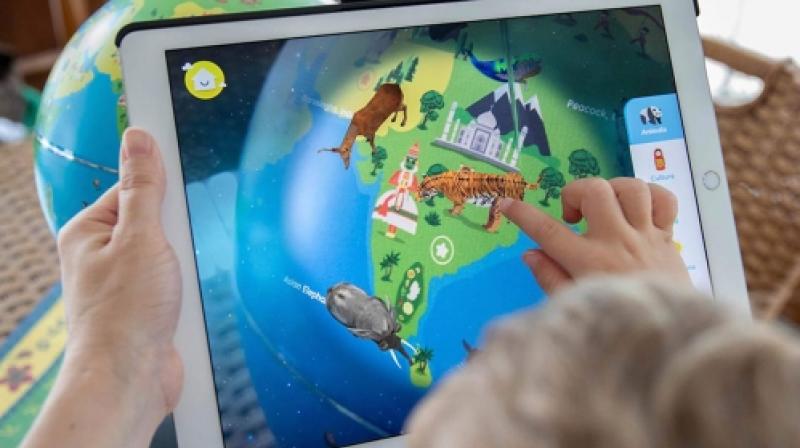 Kid playing with augmented reality toy - Augmented Reality (AR) Toys: The number is rising, quickly ...