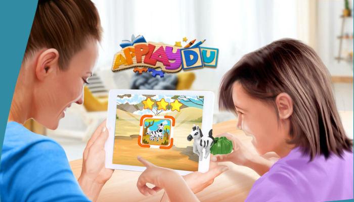 Child playing augmented reality game with physical toys - Ferrero's Kinder launches AR app to bring Kinder toys to life ...