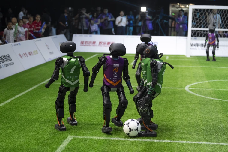 robotic soccer players - A bumbling game of robot soccer was a breakthrough for embodied AI